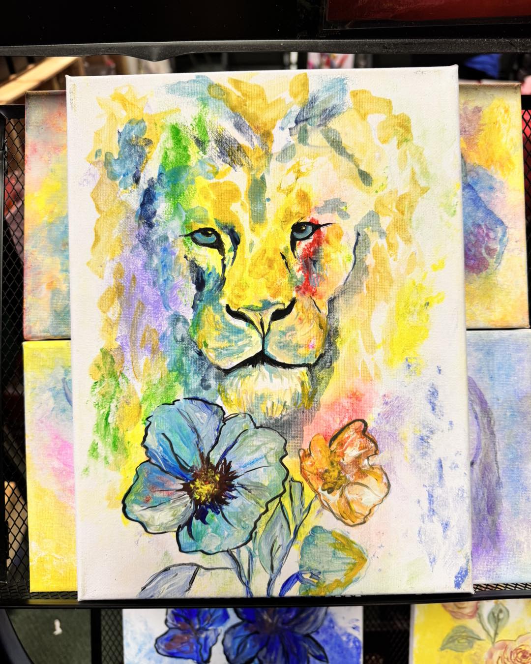 Seventh slide vibrant lion painting.