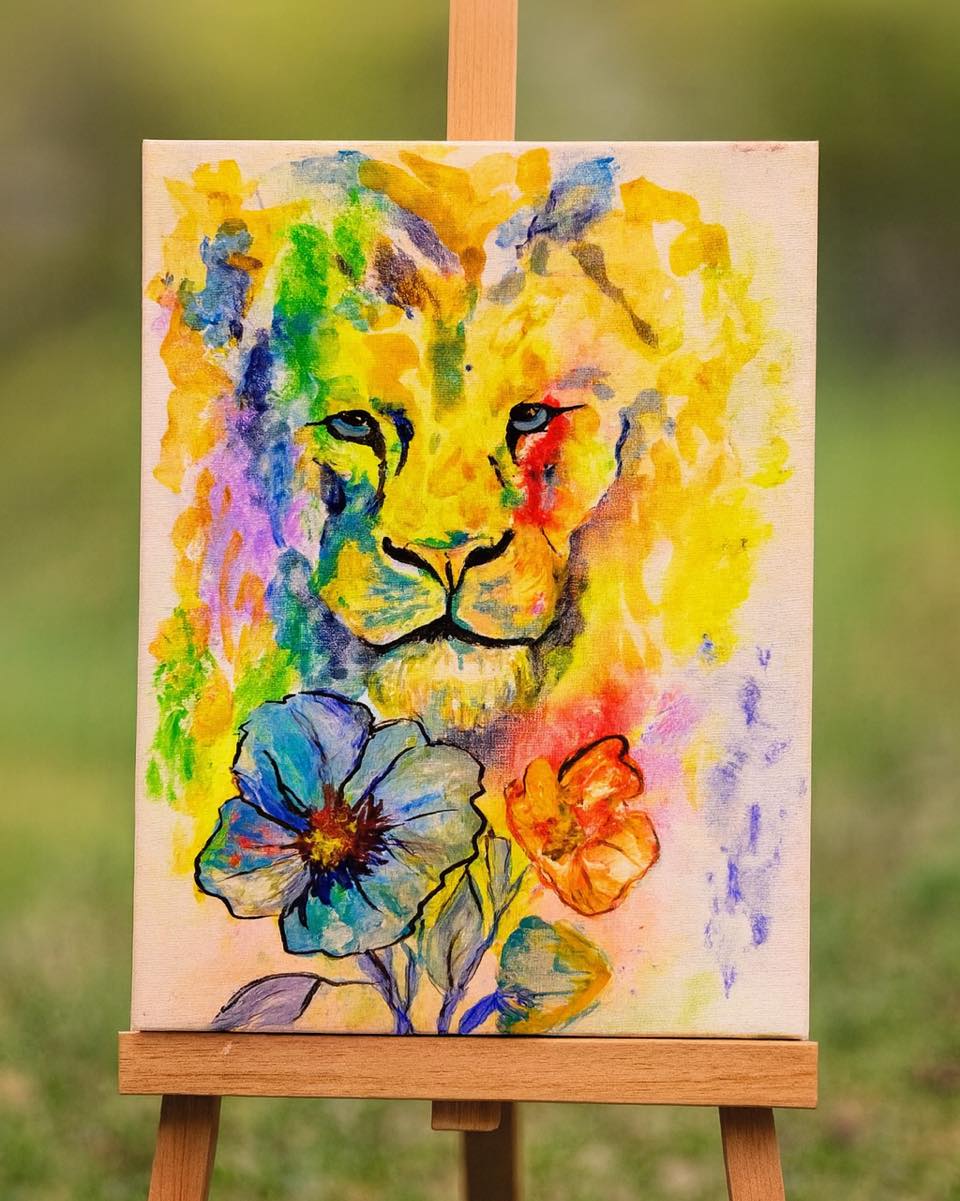Second slide vibrant lion painting.