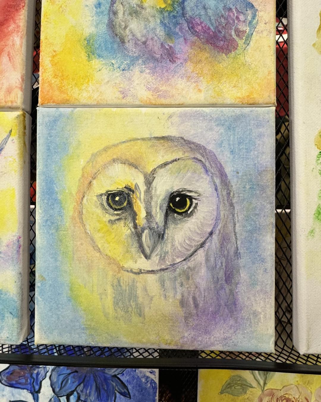 Eight slide vibrant owl painting.